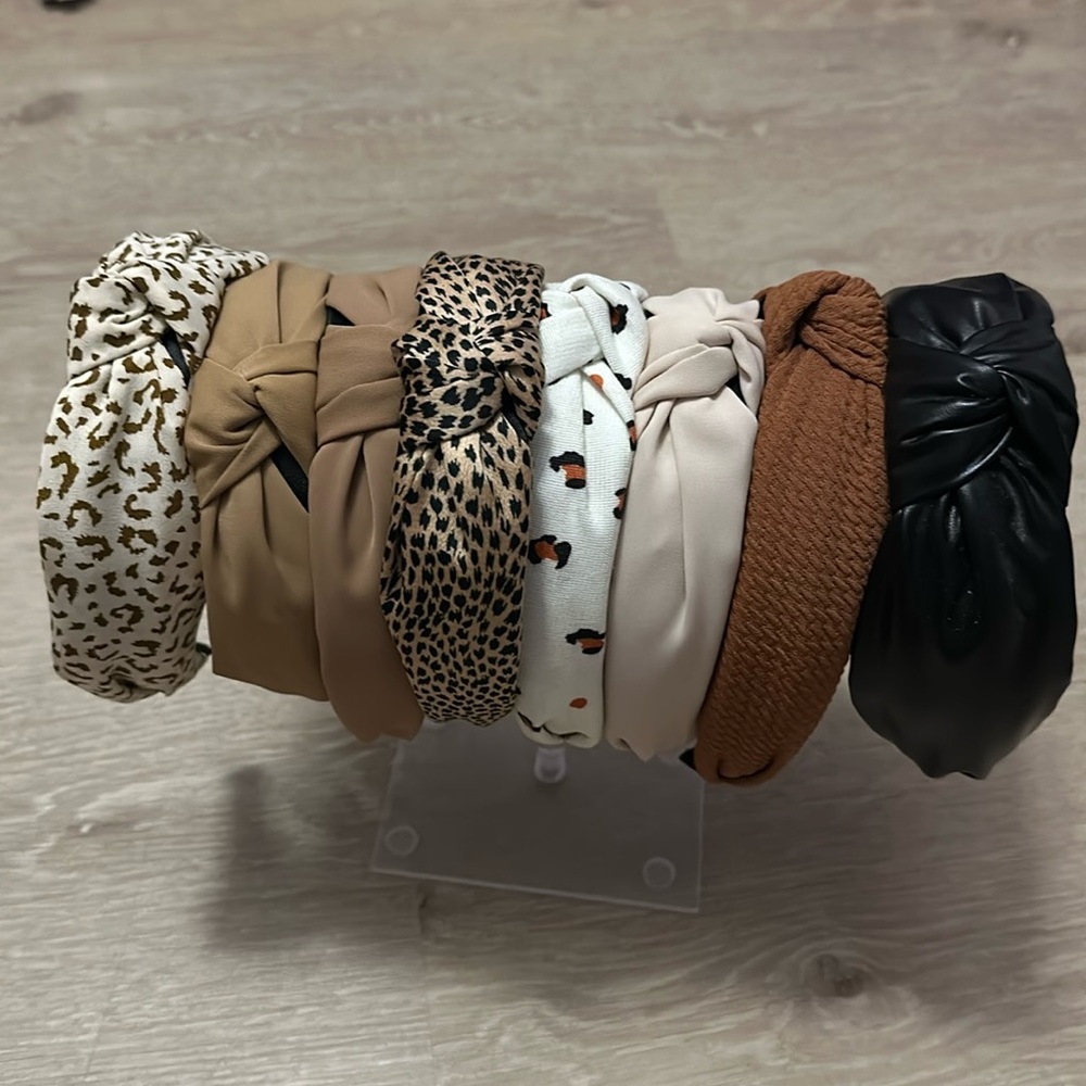8 headbands *Never worn-*